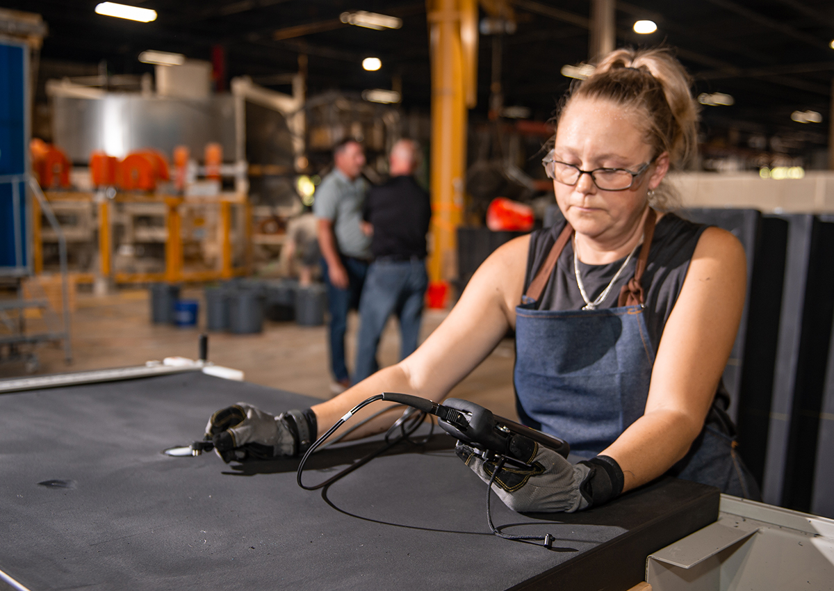 Woman checking quality of product